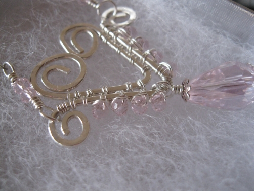 Hand-formed Wire Heart with pink glass crystals Hand-formed Wire Heart with pink glass crystals