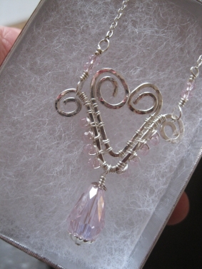 Hand-formed Wire Heart with pink glass crystals Hand-formed Wire Heart with pink glass crystals