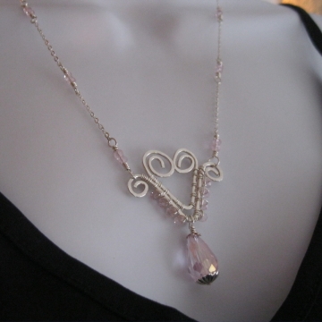 Hand-formed Wire Heart with pink glass crystals Hand-formed Wire Heart with pink glass crystals