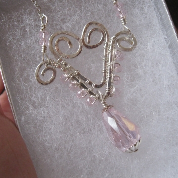 Hand-formed Wire Heart with pink glass crystals Hand-formed Wire Heart with pink glass crystals