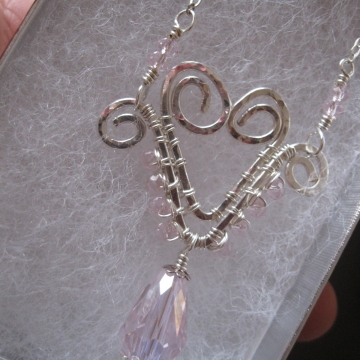 Hand-formed Wire Heart with pink glass crystals Hand-formed Wire Heart with pink glass crystals